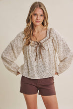 Load image into Gallery viewer, PRAIRIE ROMANCE BOTANICAL BOW TIE FRONT RUFFLED BLOUSE