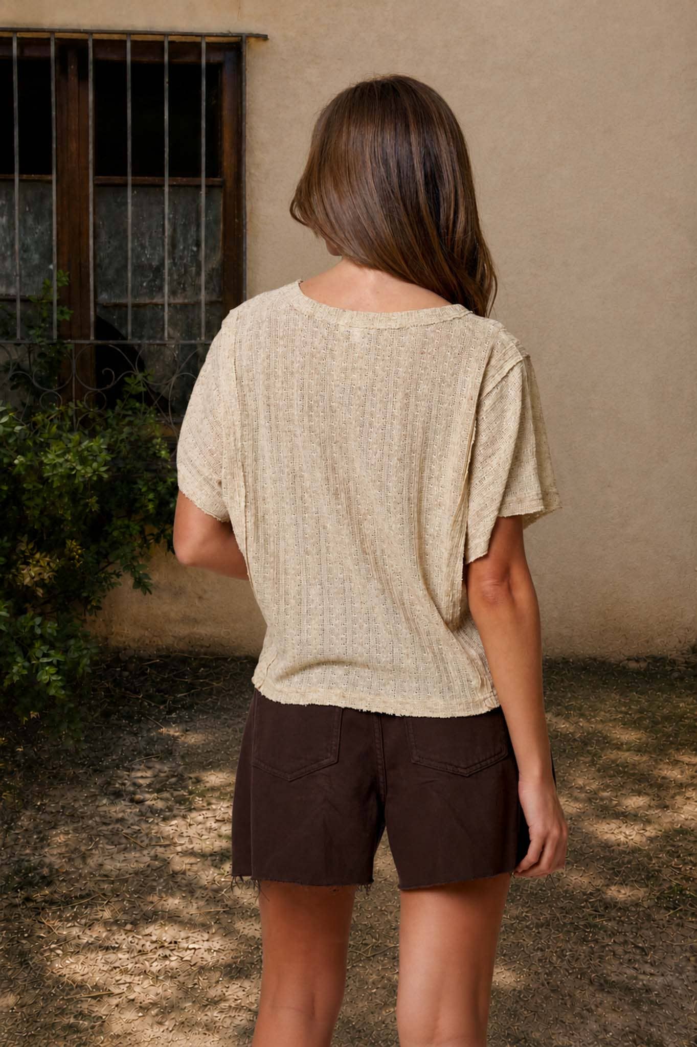 DOLMAN SHORT SLEEVE EXPOSED SEAM TEXTURED KNIT TOP