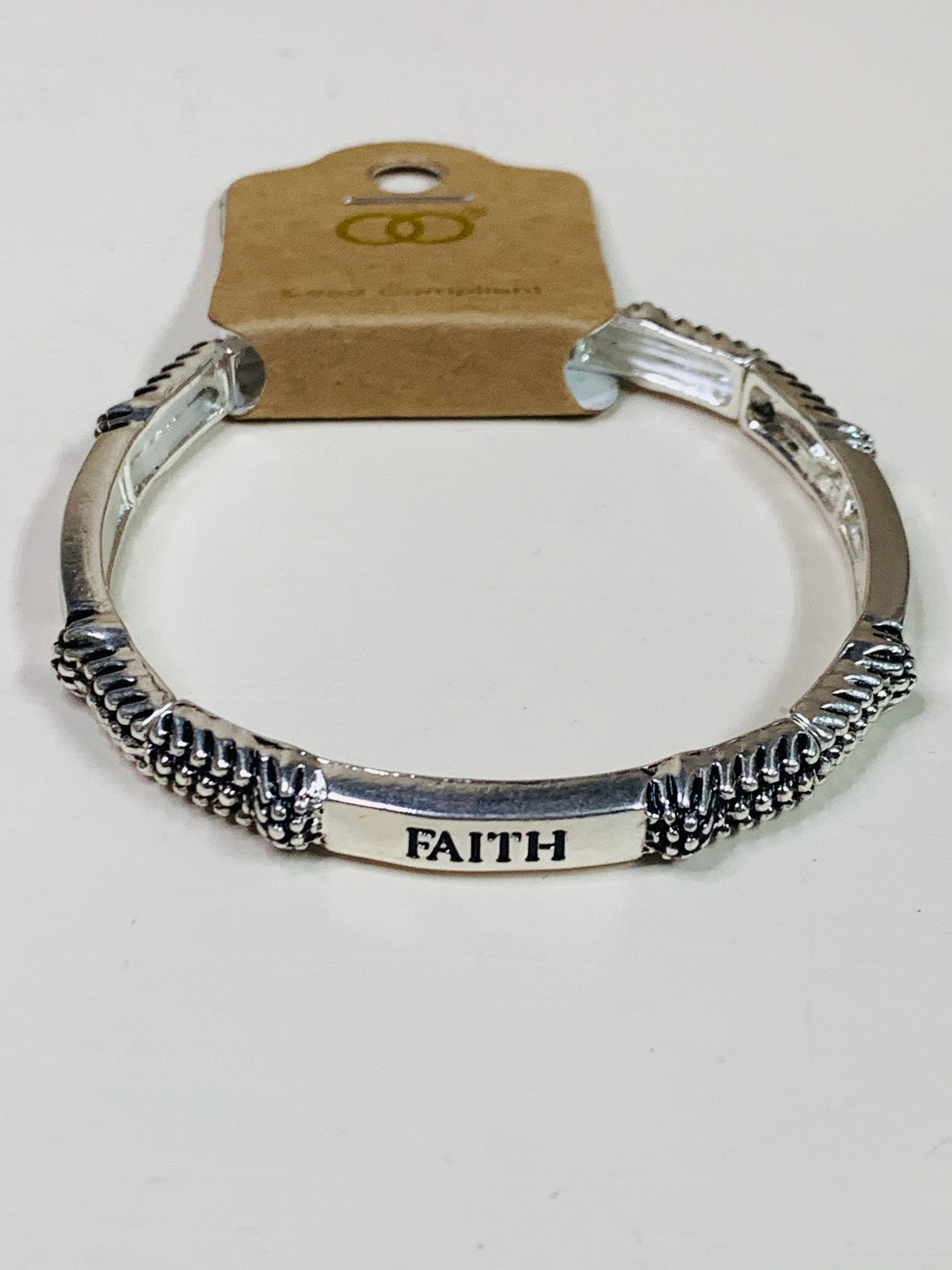 Silver “Faith” Bangle Bracelet